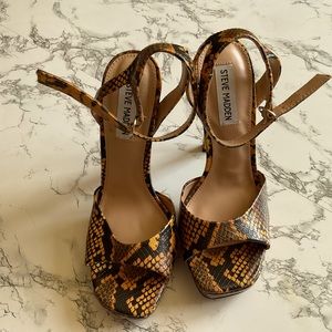 Six inch, Steve Madden snake skin heels.